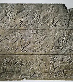 Iraqis Prints: Assyrian troops pursuing Arabs on camels