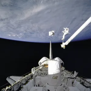 Spacesuits Prints: Astronaut demonstrate in-space rescue 130 miles from Earth