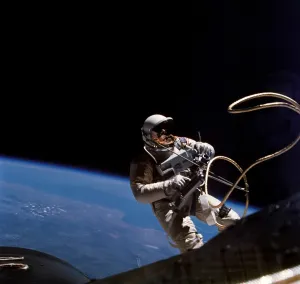 Spacesuits Prints: Astronaut Edward White floating weightless during the first US spacewalk. June 3, 1965