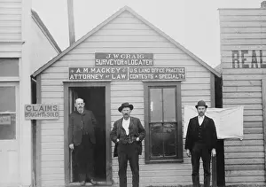 Migration Prints: Attorneys and surveyors in front of their office