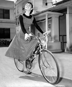 Bicycle Prints: AUDREY HEPBURN bicycles to soundstage where she is filming SABRINA, 1954