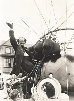 Switzerland Prints: Auguste Piccard waves as he climbed into the spherical aluminum capsule