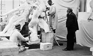 Sculptor Prints: Auguste Rodin (1840-1917) observing work on the monument to Victor Hugo in 1896