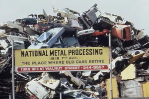 Metals Prints: An automobile junkyards shreds and compacts cars to recycle the scrap steel