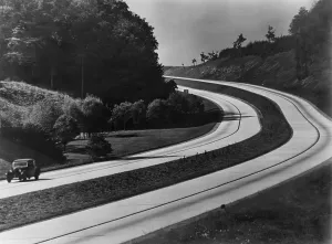 Images Dated 6th January 2009: An automobile on the sweeping curves of the Autobahn with view of the countryside