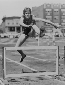 Jumping Prints: Babe Didrikson Zaharias clears hurdle at track meet in Jersey City