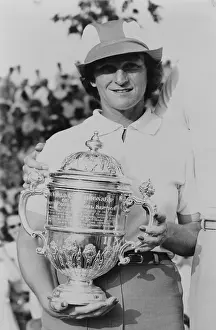 Lcgr1501 Prints: Babe Didrikson Zaharias holding trophy after the Tam O'Shanter golf tournament