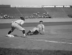 George Herman Babe Prints: Babe Ruth slides in safe at third base on Bob Meusel's fly out