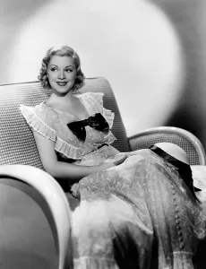 Sitting In Chair Prints: BABY TAKE A BOW, Claire Trevor, 1934