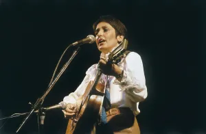 BAEZ, Joan (1941). Joan Baez during a concert in 1983. AISA/Everett Collection**US SALES ONLY**
