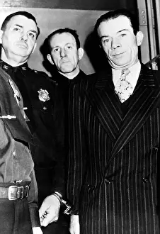Suit And Tie Prints: Bank robber and escaped convict
