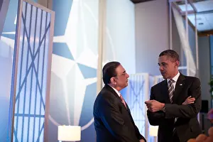 Barack Obama talks with President Asif Ali Zardari of Pakistan before a meeting on Afghanistan. They were attending a NATO Summit in Chicago, Ill. May 21, 2012