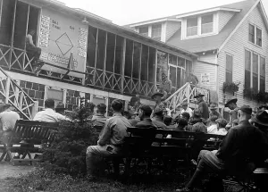 Veteran Prints: Baseball. A group of wounded World War I veterans watches the score board during the 1919 World Series between