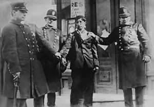 Sidewalk Prints: Battered striker with policemen during the Philadelphia Trolley Strike, Feb. 24, 1910