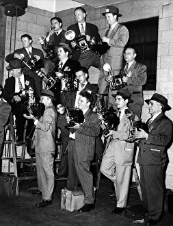 Trials Prints: A battery of news cameramen with their speed graphics at New York Federal Court