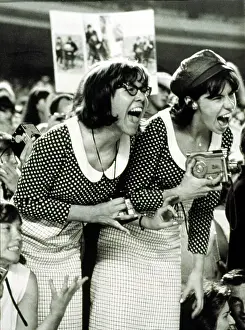 Beatles Prints: BEATLES FANS scream at a concert at Shea Stadium