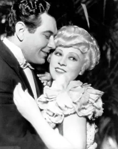 Johnny Mack Prints: BELLE OF THE NINETIES, from left: Johnny Mack Brown, Mae West, 1934