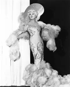 Travis Banton Prints: BELLE OF THE NINETIES, Mae West, in a gown by Travis Banton, 1934