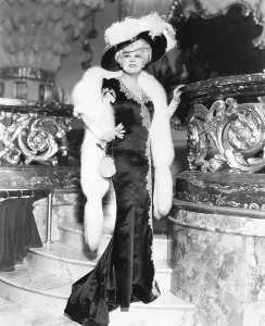 Travis Banton Prints: BELLE OF THE NINETIES, Mae West, in a gown by Travis Banton, 1934