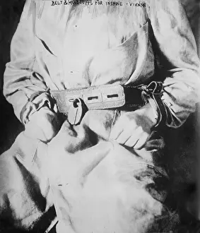 Mental Illness Prints: Detail of belt and handcuffs on an insane person