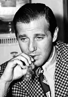Checkered Jacket Prints: Benjamin Bugsy Siegel after being taken in for questioning for the slaying of chauffer Harry Schachter in Hollywood