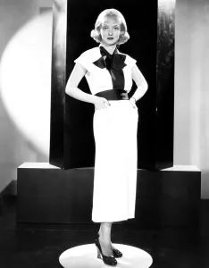 Platinum Blonde Prints: Bette Davis, modeling a black and white sports frock, 1935