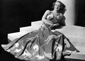 Womens Fashion Prints: Bette Davis wearing gown with calla lillies print, ca. 1937