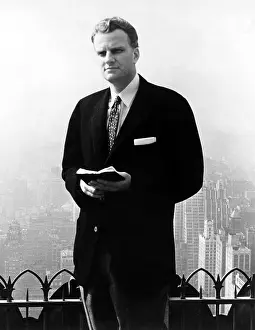 Billy Prints: Billy Graham. Evangelist with Bible in publicity for NYC Crusade in Madison Sq