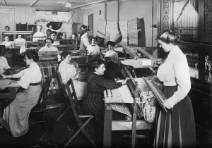 Blind Prints: Blind women weaving at looms accompanied by an orchestrion