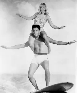 Images Dated 11th March 2015: BLUE HAWAII, Jenny Maxwell, astride Elvis Presley, 1961