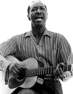 Musical Instrument Prints: Blues legend JOSH WHITE, 1964. Courtesy: CSU Archives / Everett Collection