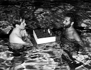 Bobby Prints: Bobby Fischer plays a chess match with Larry Evans in a indoor pool at the Grossinger Hotel in the Catskills
