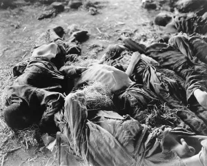 Starvation Prints: Bodies of German slaves lie where they died of starvation on prison floors of a concentration camp in Nordhausen