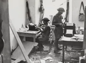 Shorts Prints: In their bomb damaged office, British soldiers at produce a news sheet