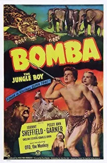 Savage Prints: BOMBA, THE JUNGLE BOY, from left: Johnny Sheffield, Peggy Ann Garner, 1949