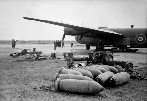 Images Dated 2nd August 2007: Bombs lie on an Allied airfield ready to be loaded into Royal Air Force Liberators