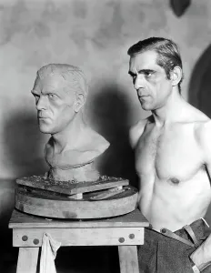 Sculptor Prints: BORIS KARLOFF caught while posing for sculptor Ivan Simpson, 1933