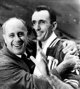 Images Dated 28th February 2007: Boston Celtics coach Red Auerbach hugs Bob Cousy after their 1963 NBA Championship win