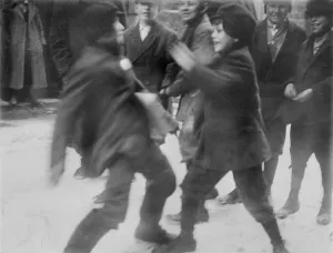 Motion Prints: Two boys fighting, original caption: Fighting is not unusual here