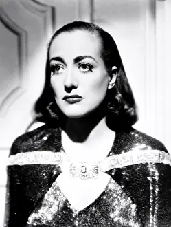 Images Dated 2nd May 2019: THE BRIDE WORE RED, Joan Crawford, in a red bugle-beaded dress by Adrian, 1937