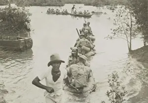 Colonies Prints: British Indian Army crossing a river in collapsible rubber boats in Singapore