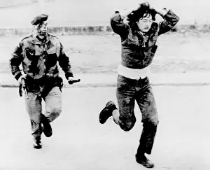 Soldier Prints: British soldier chasing a demonstrator during a riot in Londonderry