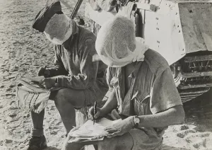 Shorts Prints: British soldiers with their heads covered by mosquito nets keep flies away