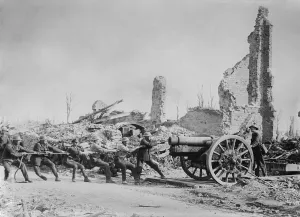 Pulling Prints: Six British soldiers pull a gun into position amid ruins in France during World War 1