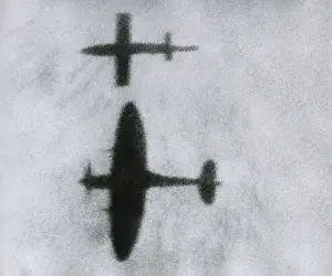 Lcgr1404 Prints: British Spitfire flies beside a V-1