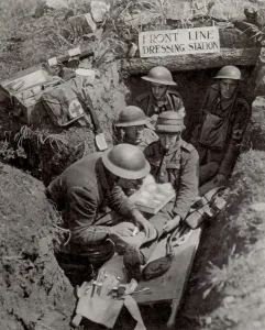 Bandages Prints: British WW1 soldier treated for a leg wound in Front Line Dressing Station