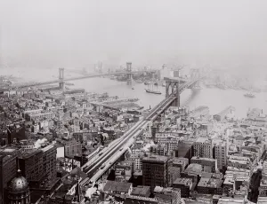 Harbors Prints: Brooklyn Bridge and Manhattan Bridges distant viewed from a downtown Manhattan skyscraper