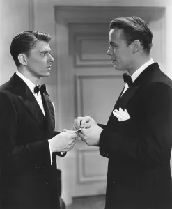 Images Dated 8th September 2015: BROTHER RAT AND A BABY, from left: Ronald Reagan, Wayne Morris, 1940