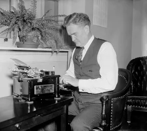 Public Relations Prints: Bruce Barton at a typewriter, possibly when the adman and author served in Congress from 1937 to 1941