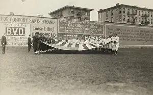 Brooklyn Prints: Buffalo Bisons and Brooklyn Tip Tops baseball players holding a large American flag